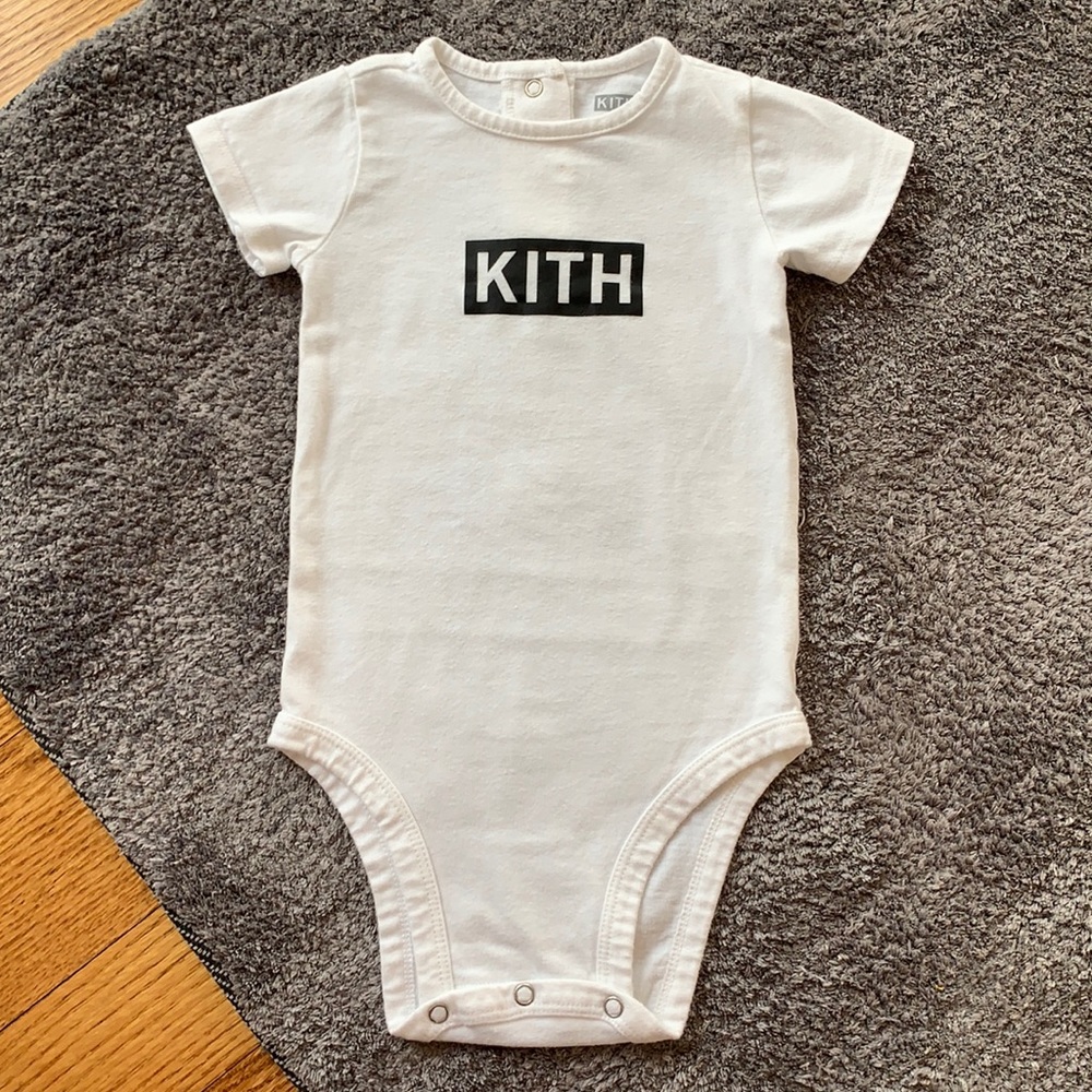 Kith printed classic logo on front onesie